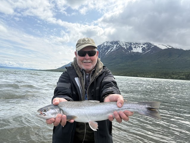 Joe Kelly with a Dolly Varden catch on Margot Creek in Alaska